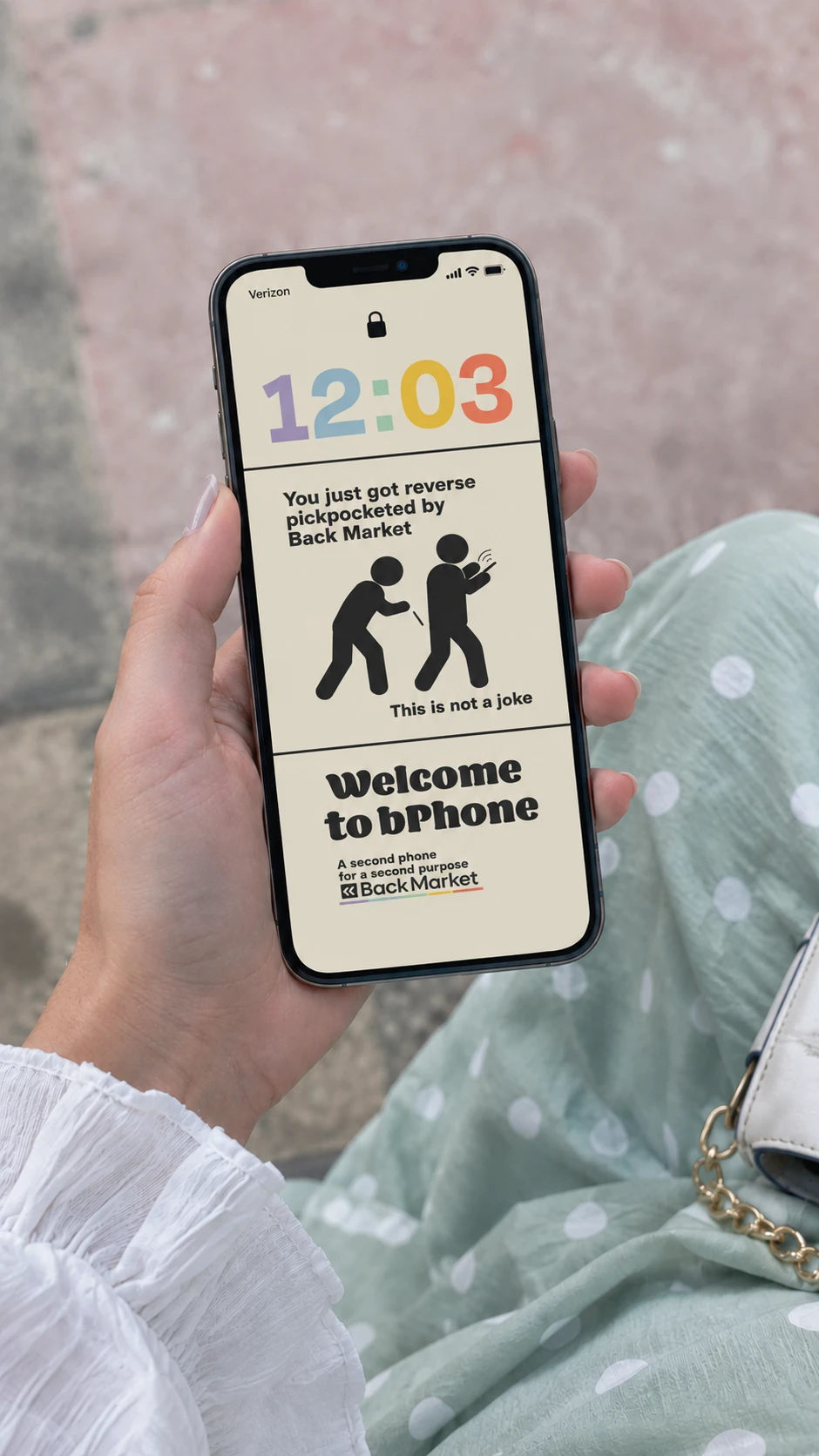 A bPhone lock screen: 'You just got reverse pickpocketed by Back Market. This is not a joke. Welcome to bPhone. A second phone for a second purpose.'