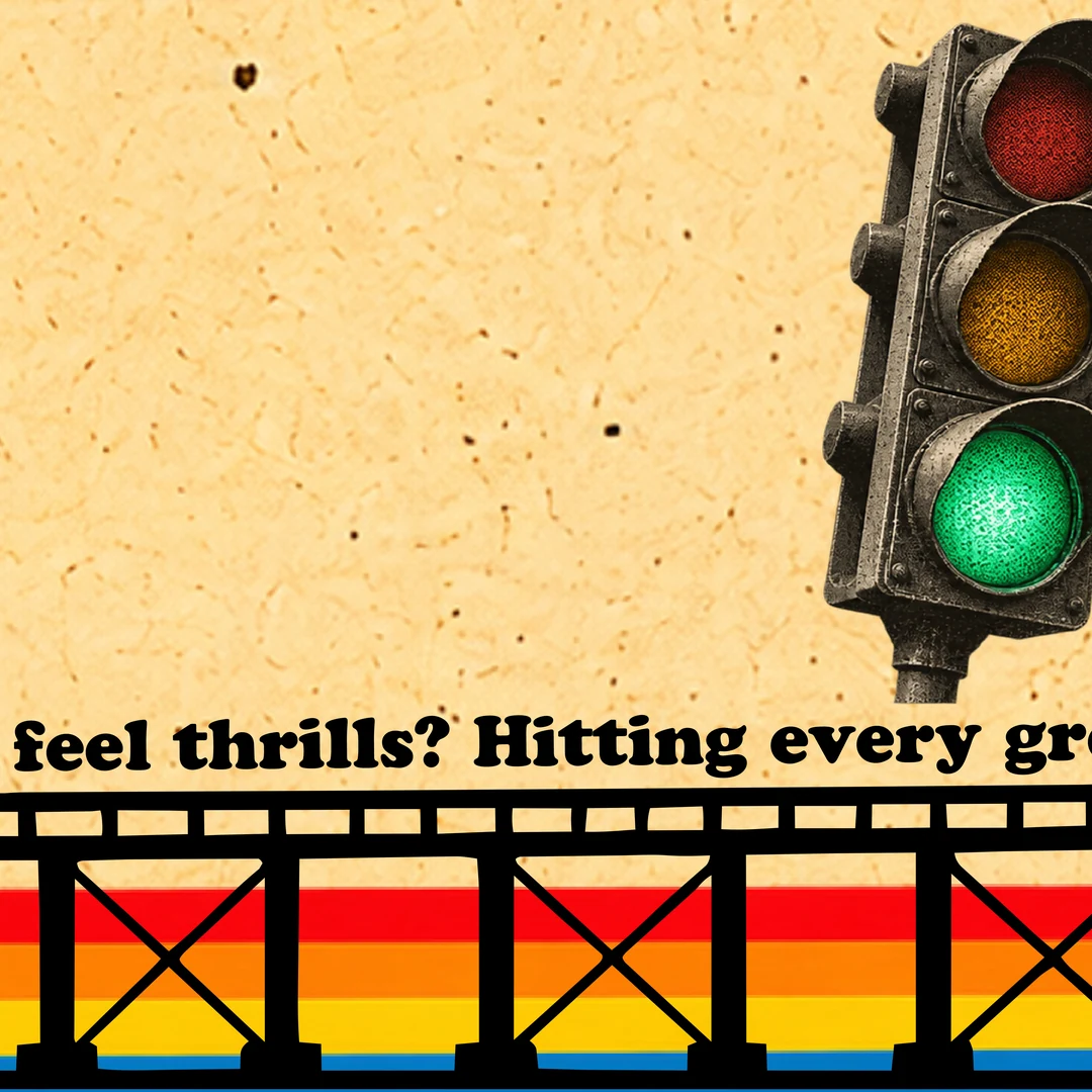The track continues under a traffic light on green: 'feel thrills? Hitting every green'